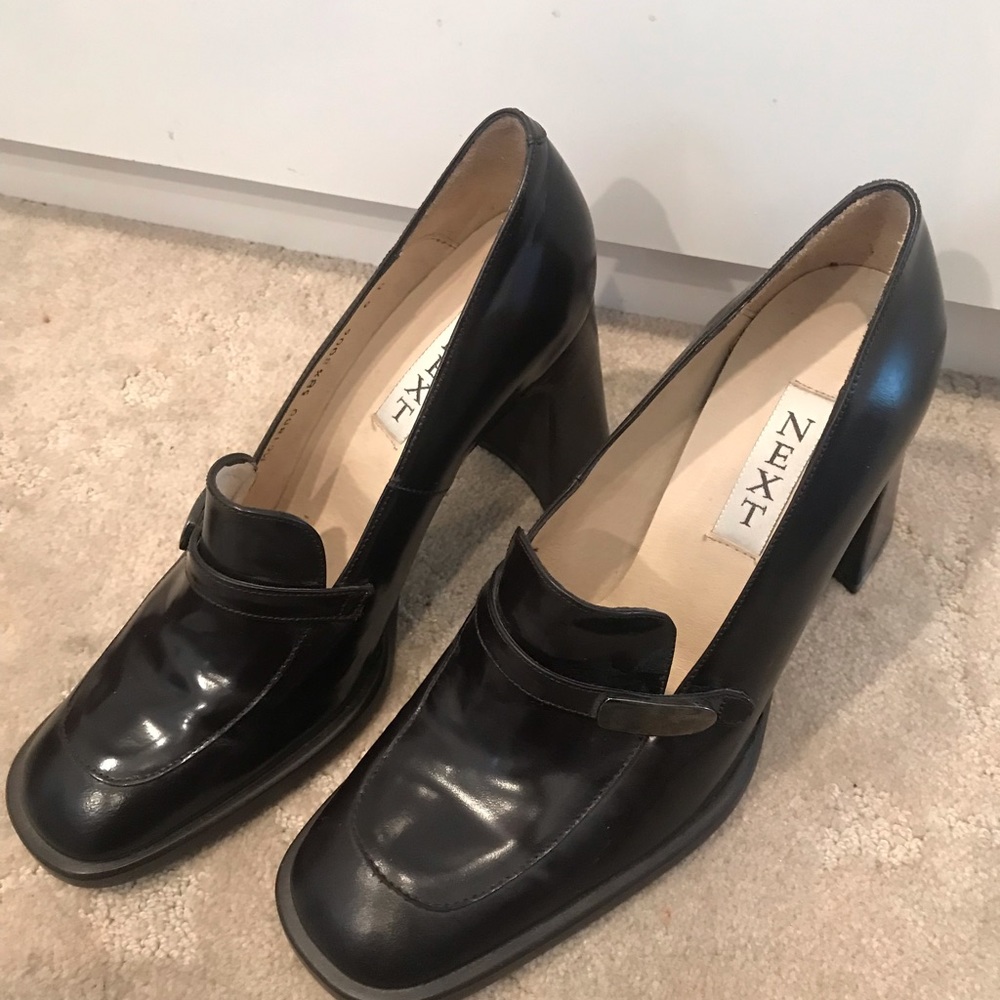 A sleek dark brown NEXT loafer
